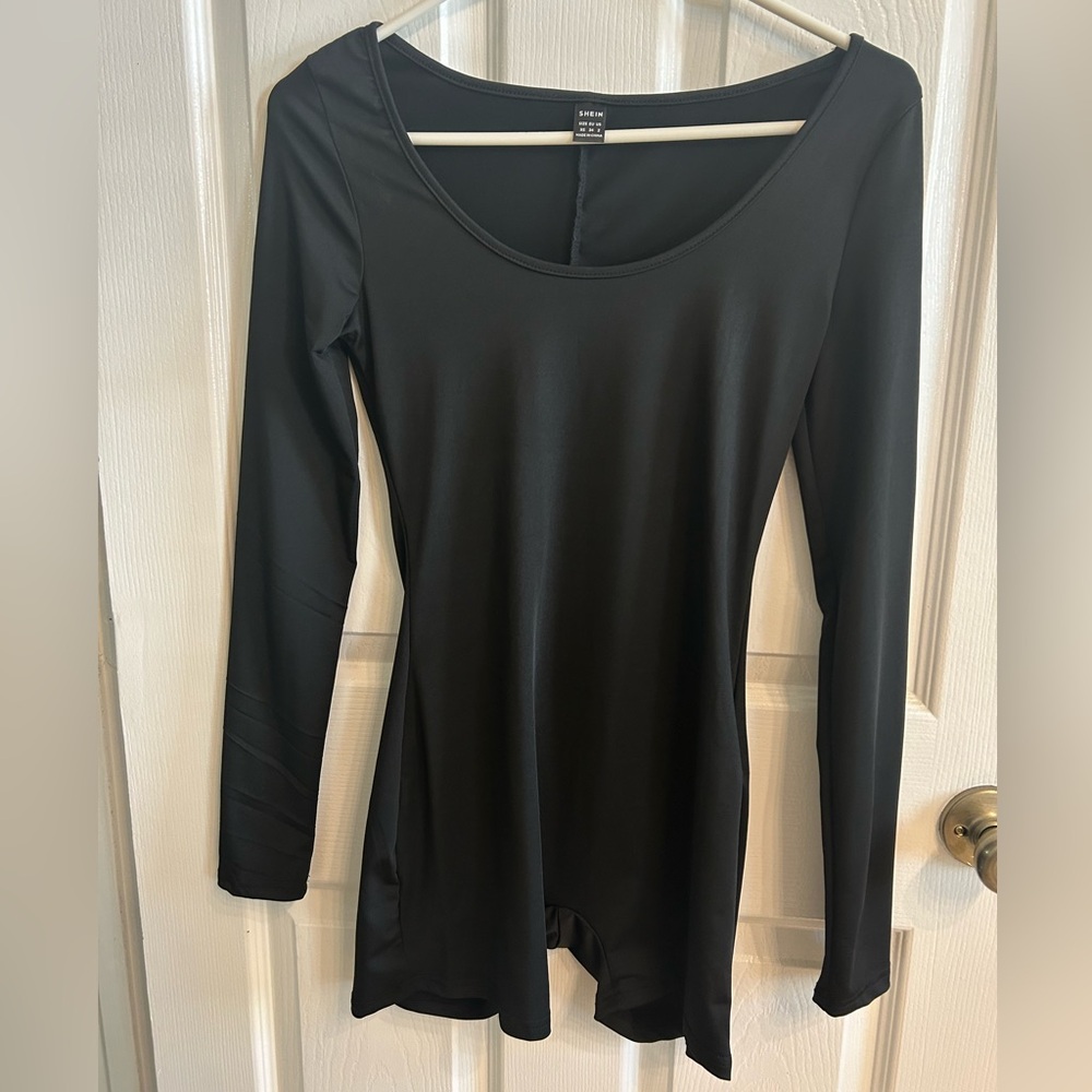 Black long sleeve bodysuit xs but fits more like a small!